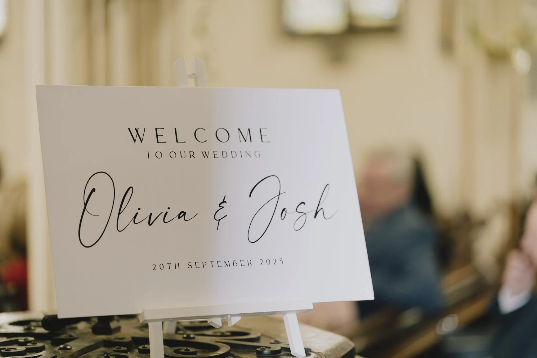 Wedding welcome sign with the names Olivia and Josh, dated September 20, 2025.