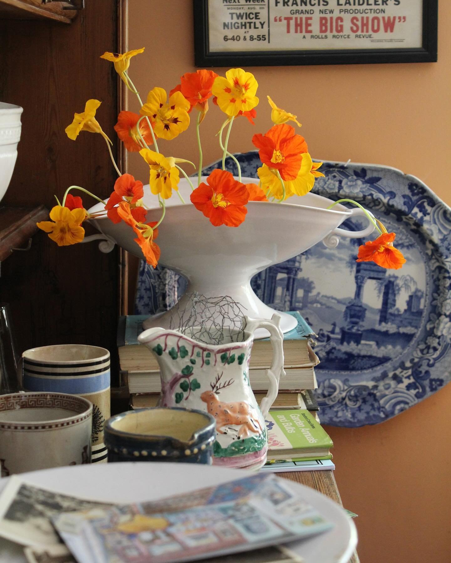 Another gem from @sean_anthony_pritchard Outside In. A tin white stoneware bowl I made especially for @glassette two years ago holding Nasturtiums in a more restrained way than I could ever manage. It really does mean so much when lovely stylish peop