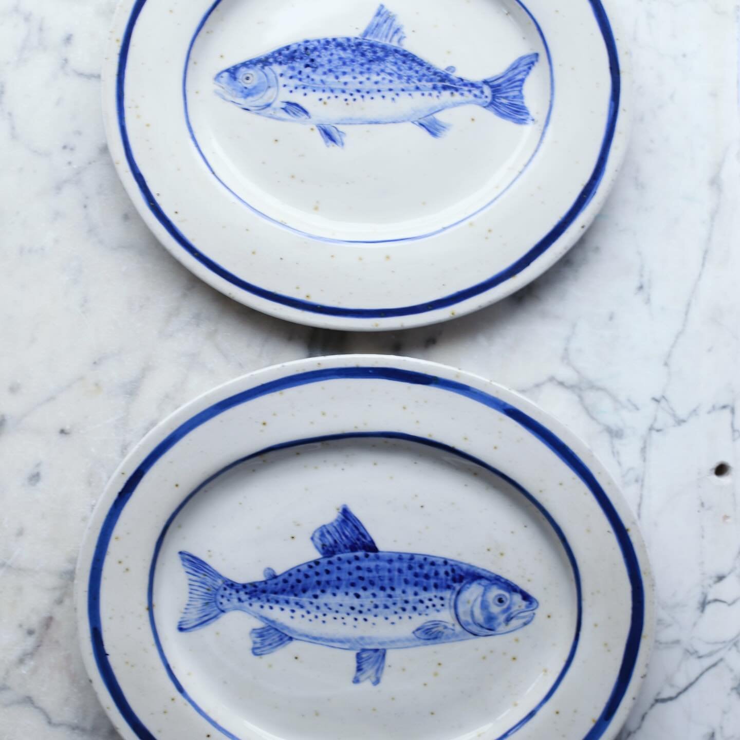 Some oval fishy platters I made before Christmas. Thrown on the wheel then altered and put on a slab base. I&rsquo;m going to start some more next week hopefully. 
#platter #pottery #fishplatter #fishplate #trout #lustre #blueandwhite #handpainted #h