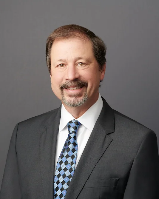A professional headshot of Joe Mikrut, a Partner, at Capitol Tax Partners.