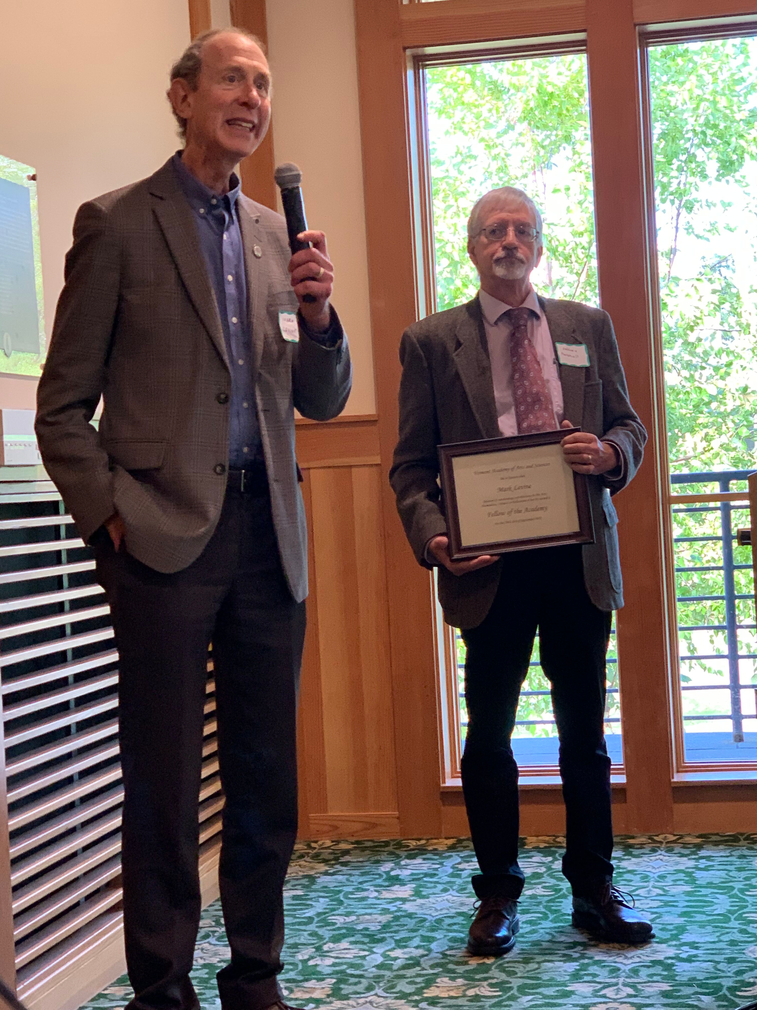 Vermont Commissioner of Health, Mark Levine, is honored as a Fellow with Jeff Marshall presenting