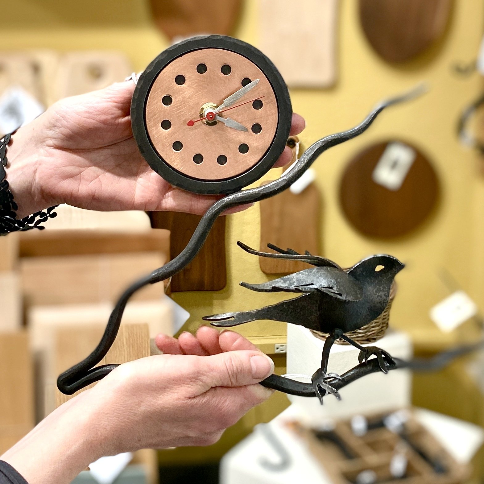 Welcome to today's Staff Pick! Gallery manager Deborah Van Ness selected this bird wall clock by blacksmith Steven Bronstein of @blackthorneforge. She really loves that it's a functional art piece.

In addition, she finds it to be a perfect reflectio
