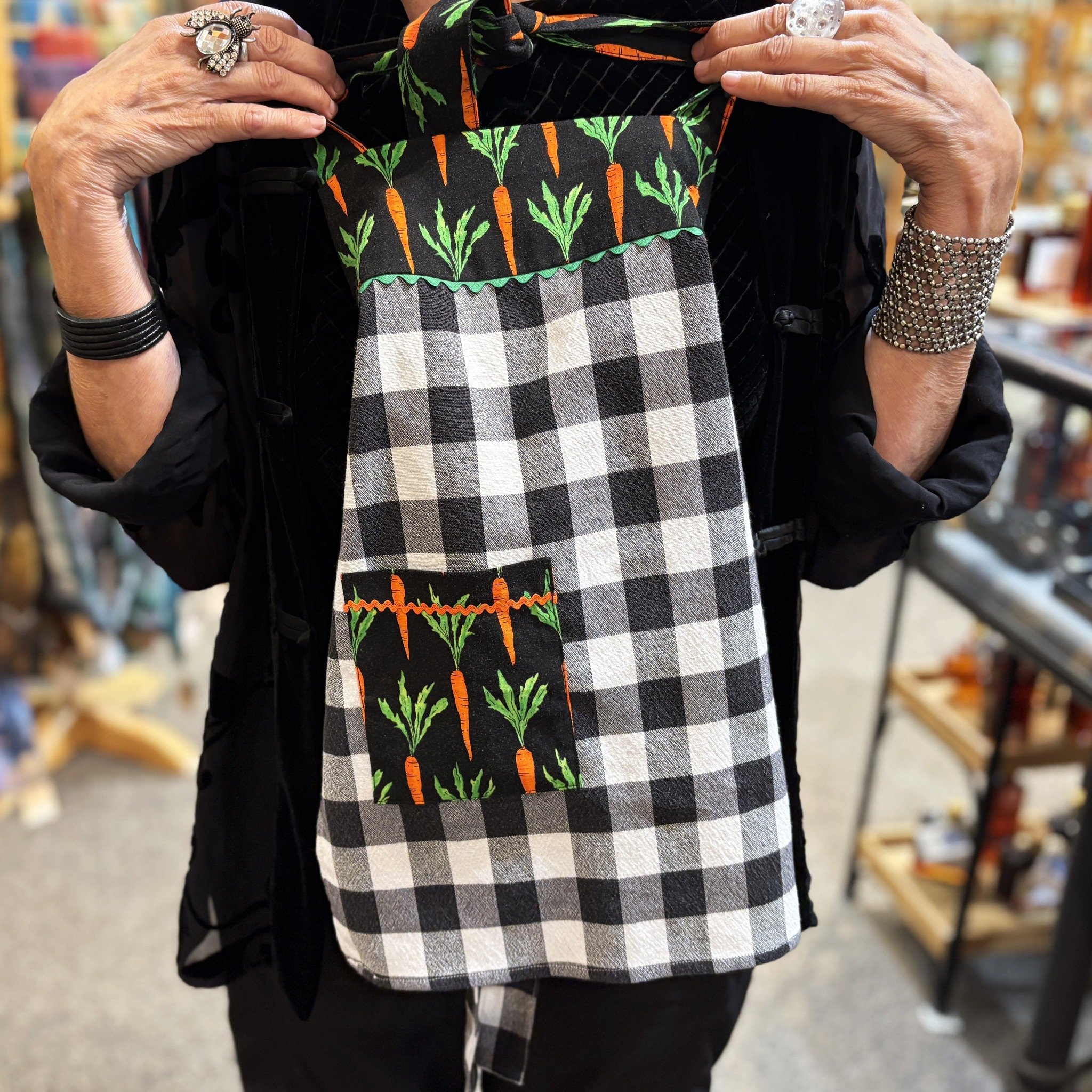 Welcome to today's Staff Pick! Staff member Marietta selected a handmade apron sewn by Montpelier fiber artist Paula Smyrski.

Marietta stated that she chose the apron because it's appropriate for planting season. She added that she wishes it came in