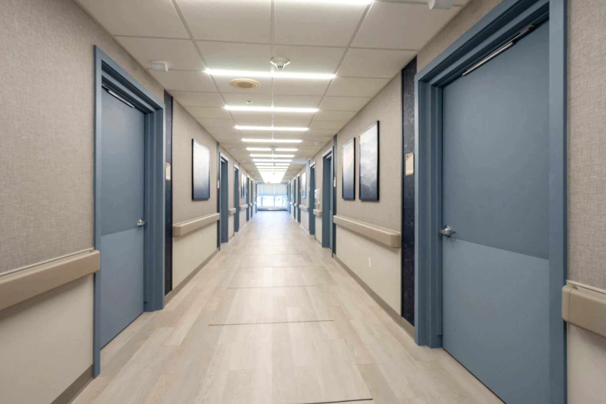 Image of renovated nursing home hallway by Expert Building Maintenance, Inc.