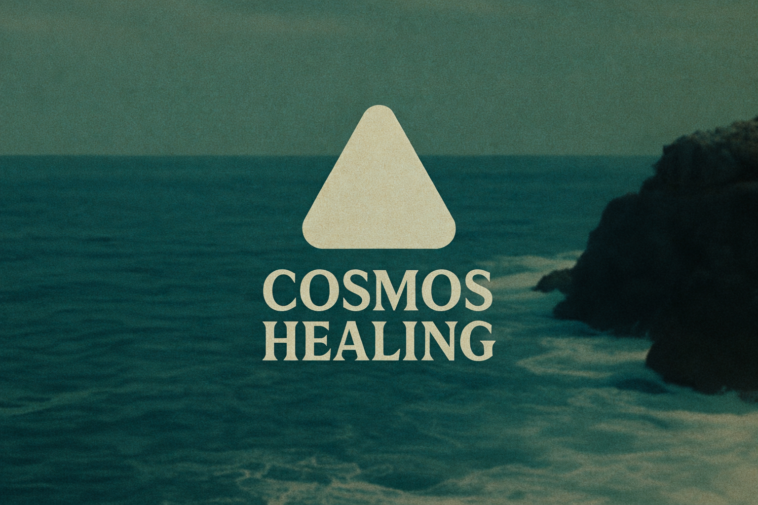 A logo for Cosmos Healing featuring a beige triangle over a background of ocean waves and rocky cliffs