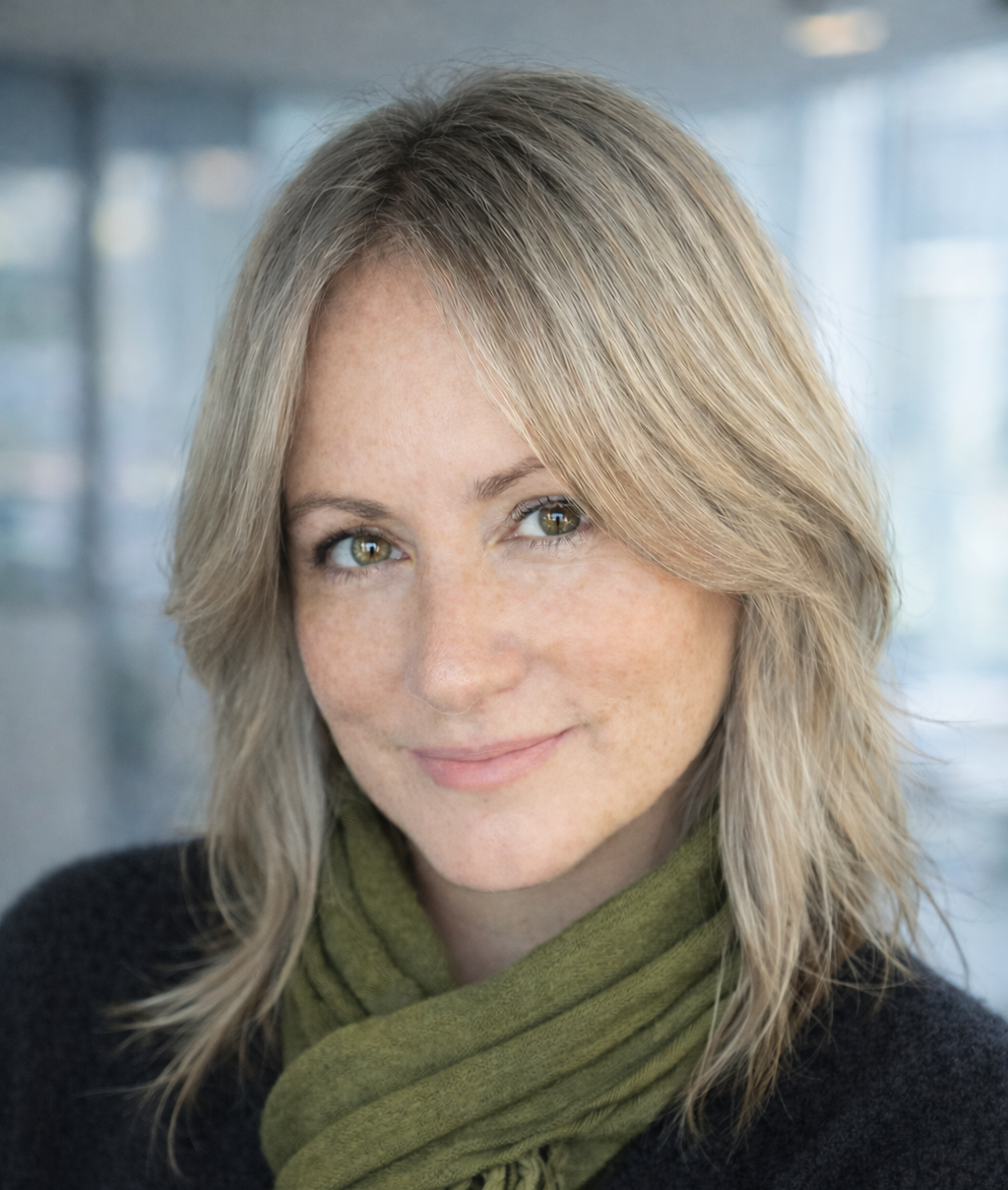 A woman wearing a green scarf.