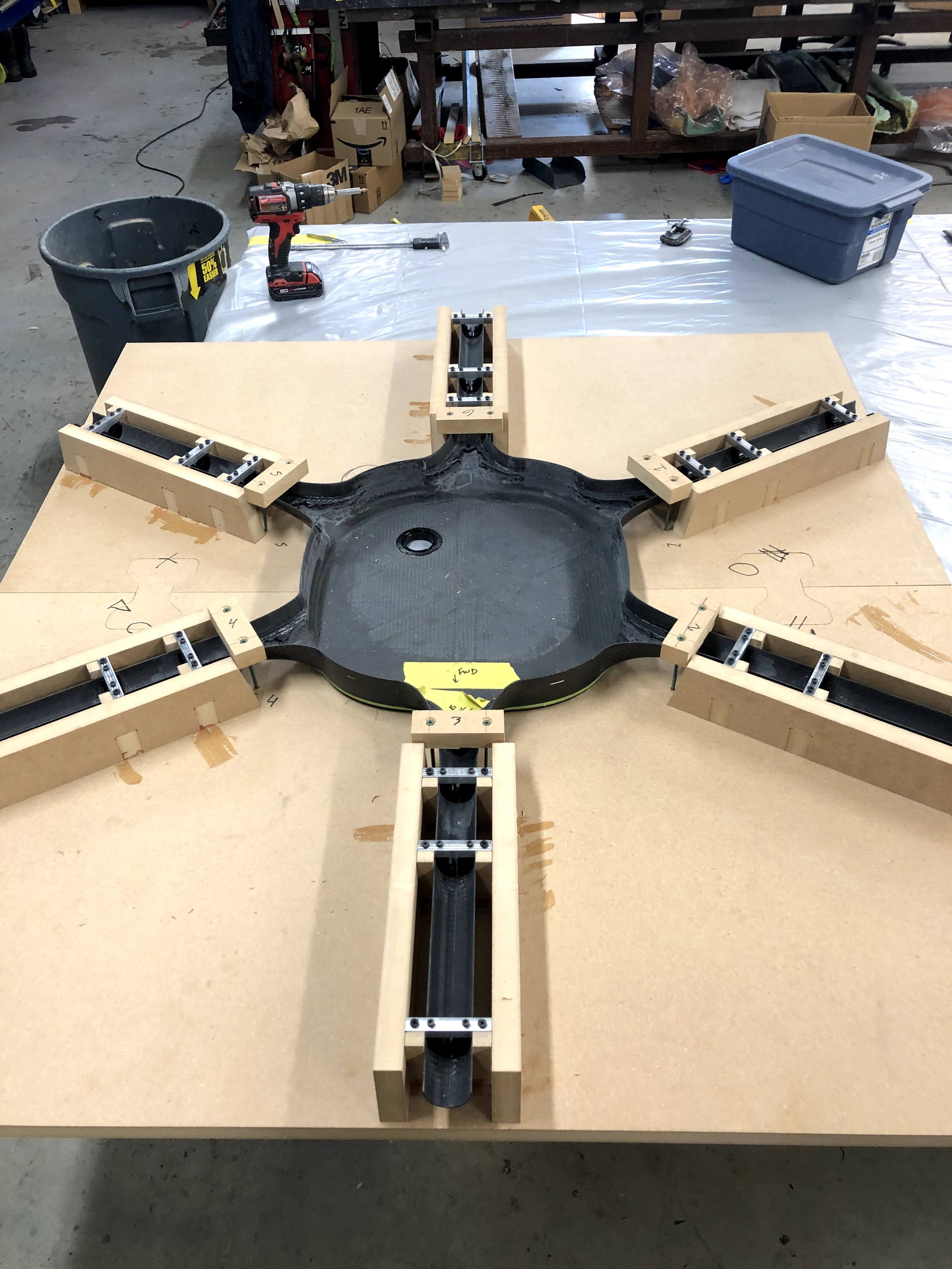 Fixture for gluing in the propeller conduits
