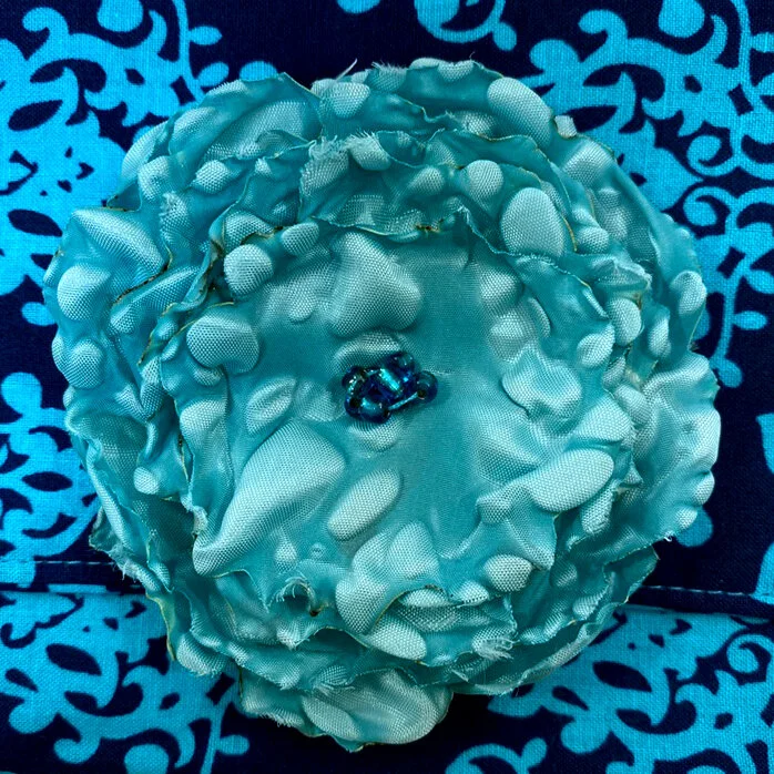 Palace Blue Snap Clutch Flower 1x1.jpg