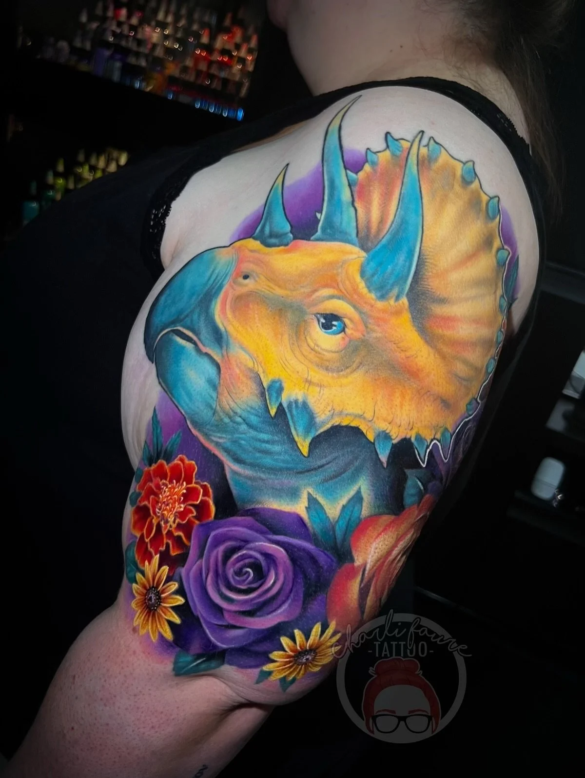Exciting collaboration between @nickos.one and @charlifury_tattoo 🌼💜🌿 really fun project! Nickos made the gorgeous triceratops and Charli made the florals and together the colour pallet and styles really came together beautifully. The triceratops
