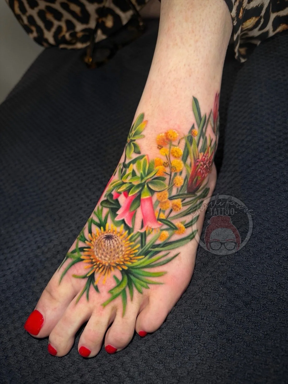 We started Susie&rsquo;s foot tattoo at the @theirongatetattooconvention last year. Wish I could have sat this well for my feet tattoos 😅 thanks again Susie! 💕

Please feel free to fill out a booking form via charlifaure.com 🖤

#canberratattoo #ta