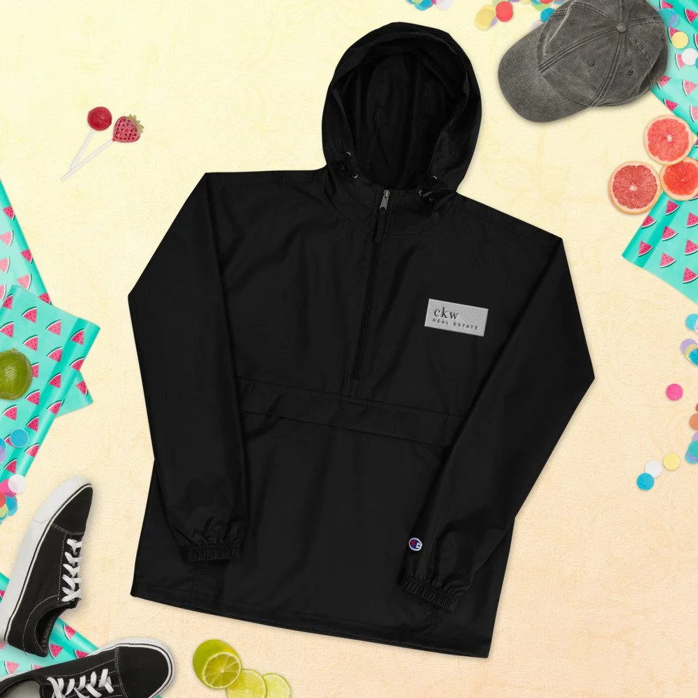 embroidered-champion-packable-jacket-black-front-61ba6dacaddb3.jpg