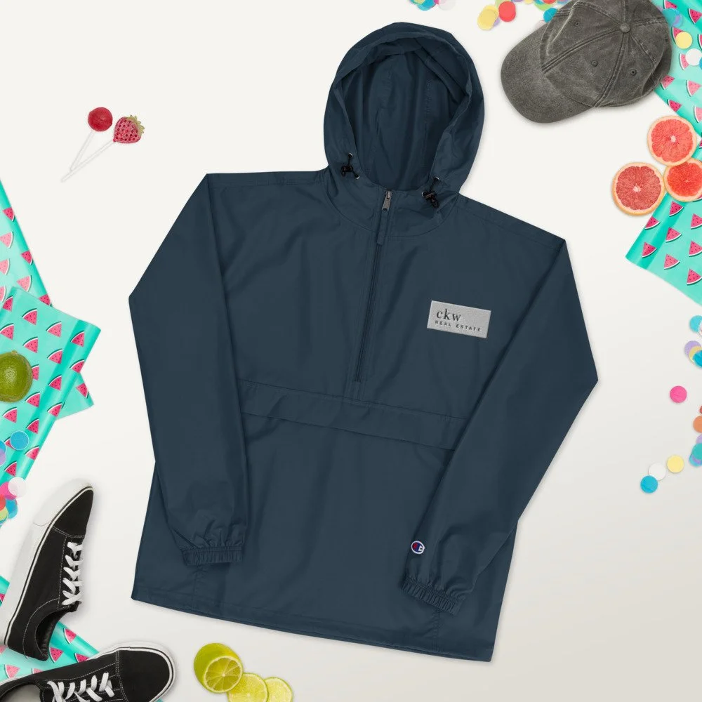 embroidered-champion-packable-jacket-navy-front-2-61ba6dacadf54.jpg