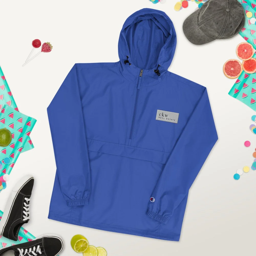 embroidered-champion-packable-jacket-royal-blue-front-2-61ba6dacae00d.jpg