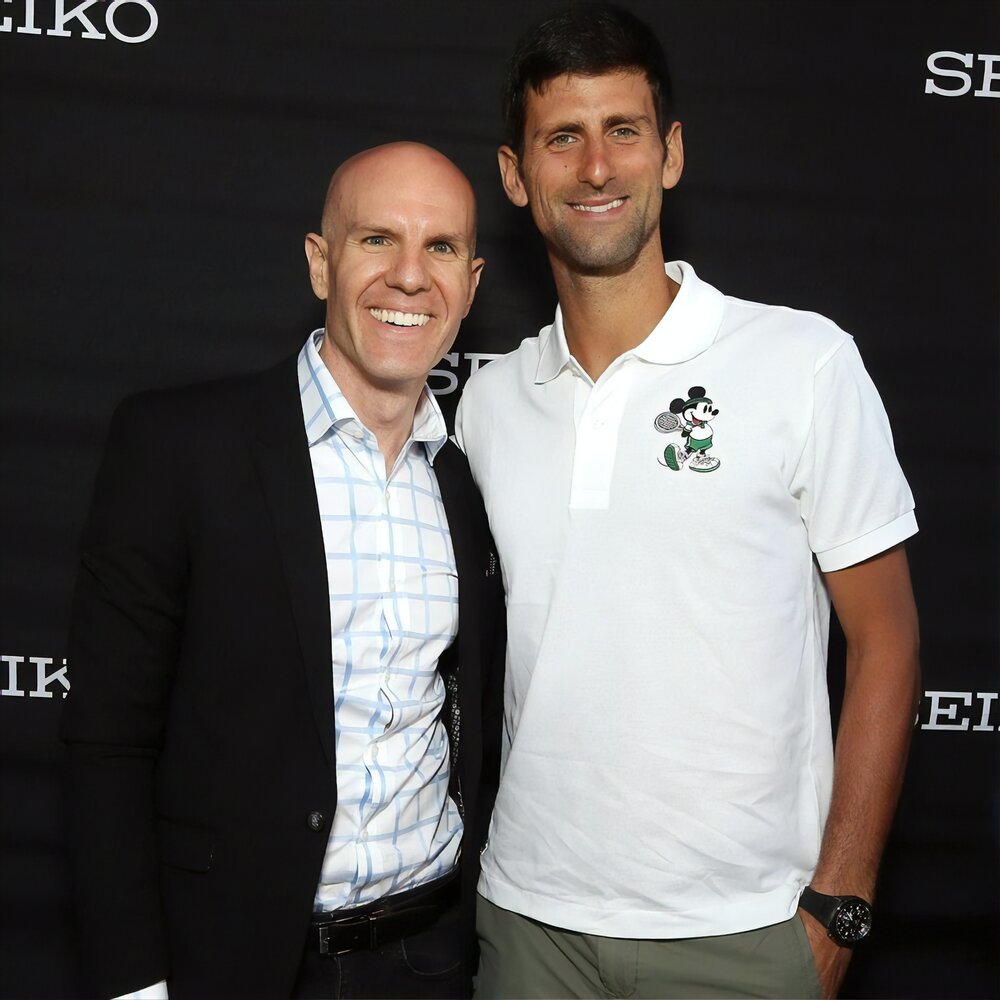 Adrian with Novak Djokovic. Photo: Adrian Falk/Lacuna Voices