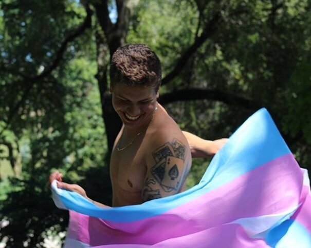 Emmett in a rainbow flag. Photo: Nataly Seguel Garcia