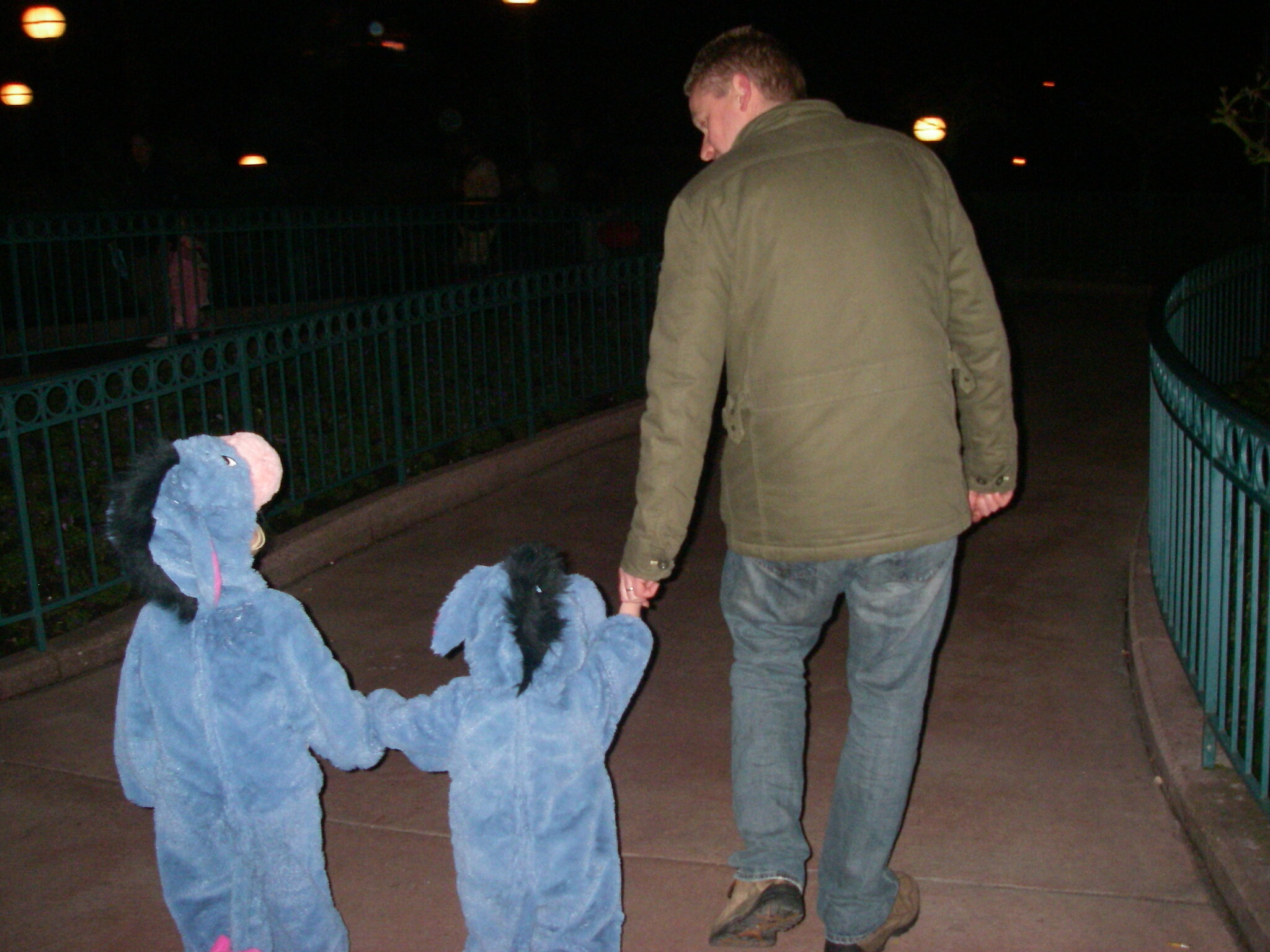 The girls dressed as Eeyore holding dad Steve's hand. Photo: Lorraine Gibson/Lacuna Voices