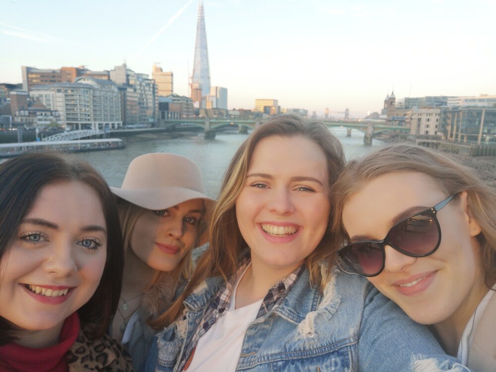 Niamh, left in London with friends who'd come to visit. Photo: Niamh Burns/Lacuna Voices