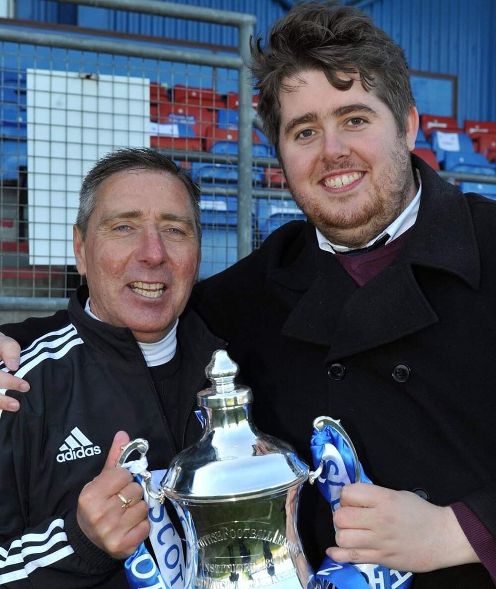 Reporter Joshua with football manager Jim McInally. Photo: Joshua King/Lacuna Voices 