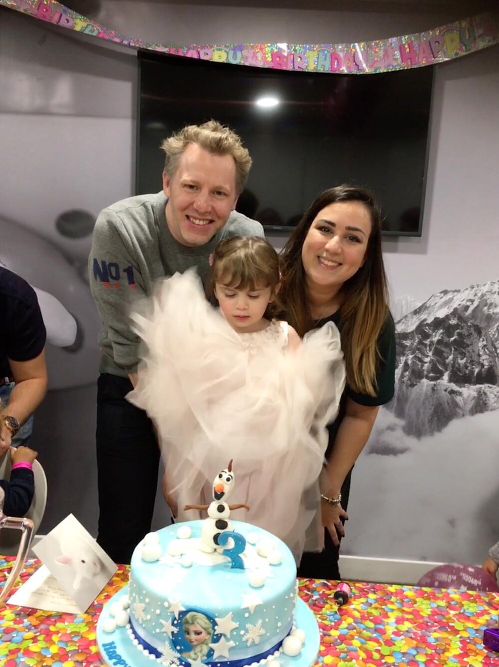 Celebrating Millie's 3rd birthday with a party and cake. Photo: Lacuna Voices