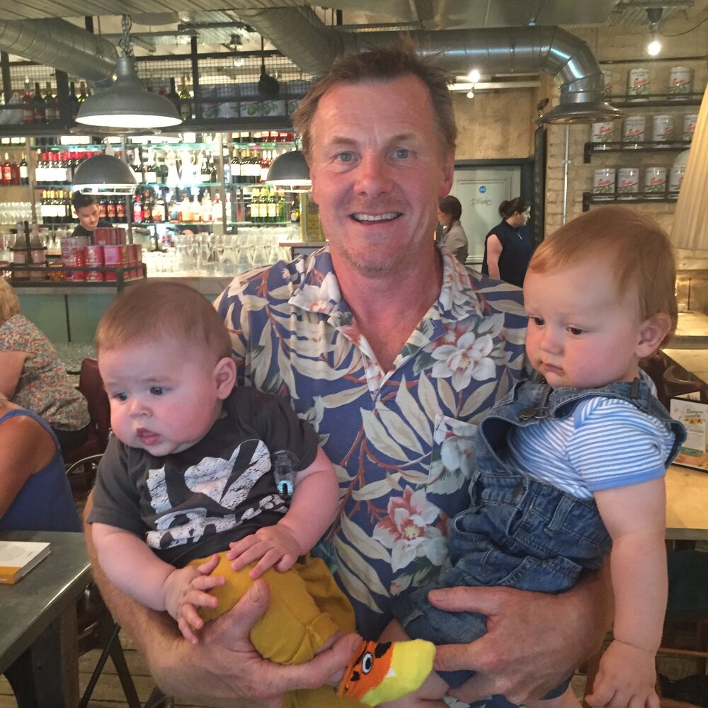 Dan's father Nigel with his grandson Sid (left) and son Arlo (right). Photo: Dan Hughes