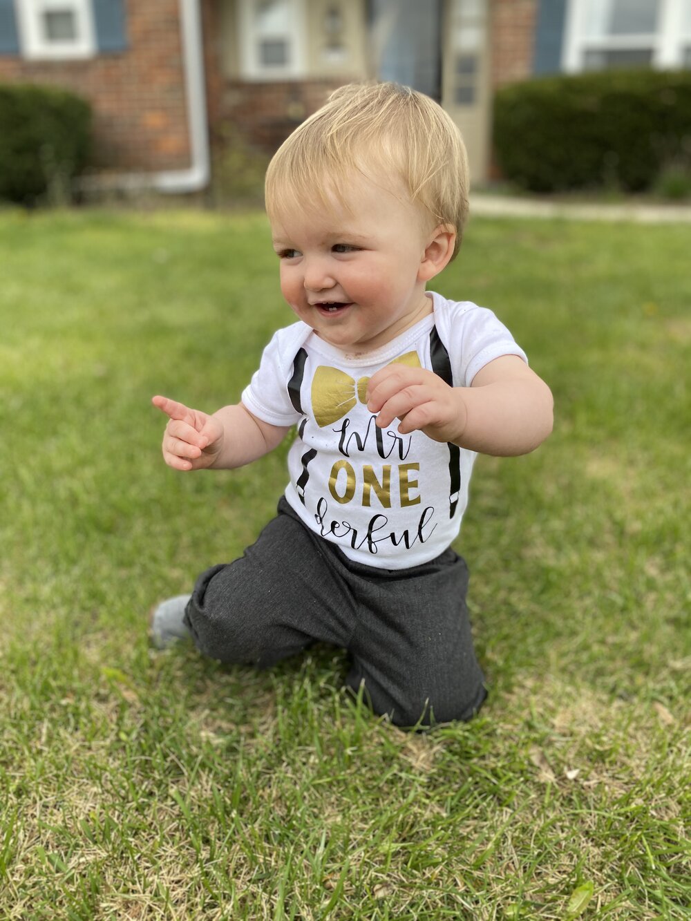 Wyatt turns one. Pictured wearing a cute t-shirt that looks like it has braces and bow. Photo: Angela Hatem