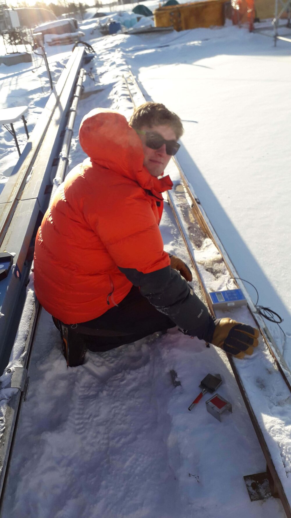 Robbie taking ice samples during an experiment at the University of Manitoba. Photo: Robbie Mallett
