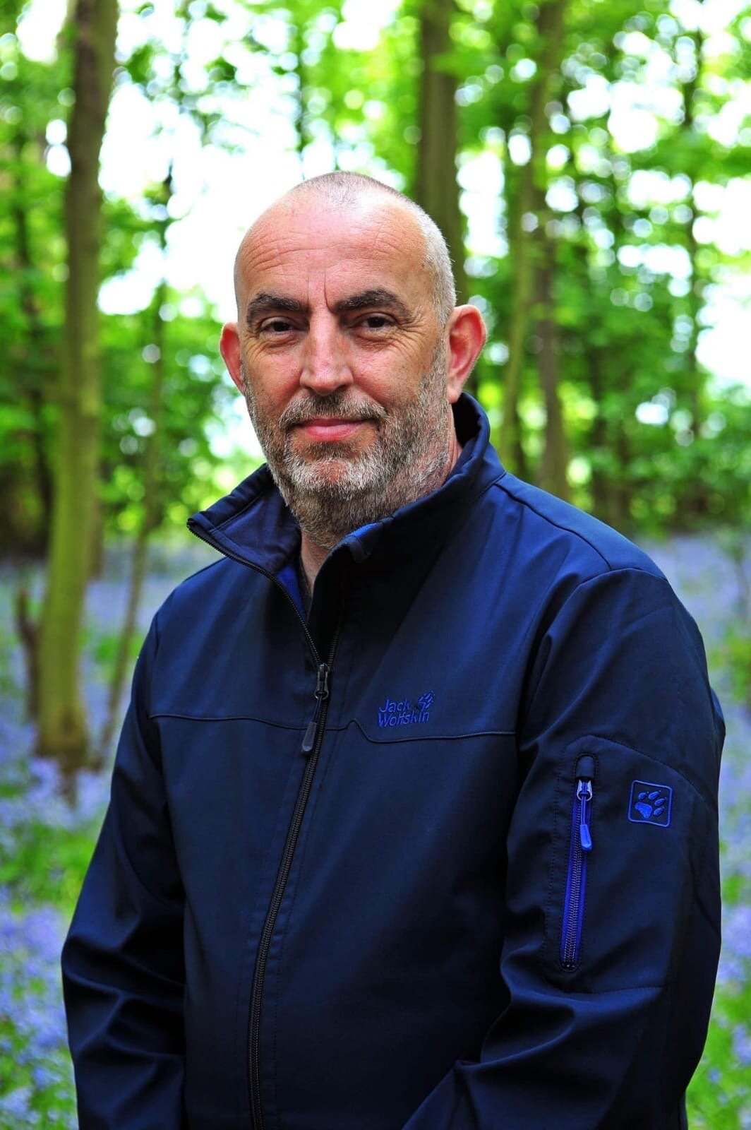 Copywriter and web designer Stuart Walton looking serene against a backdrop of bluebell woods. Photo: Steve Grogan Photography