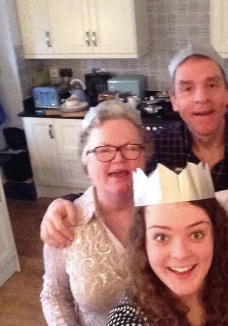 Olivia with her mum and dad. Photo: Olivia-Devereux-Evans