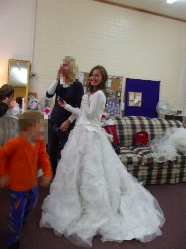 Claudia dressed as a bride during a Youth Activity in 2011 standing up. Photo Claudia Parker_censored.jpg
