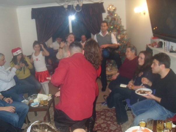 Nicol and many of her relatives in the lounge, eating and listening to music at Christmas. Photo: Nicol Lamaa