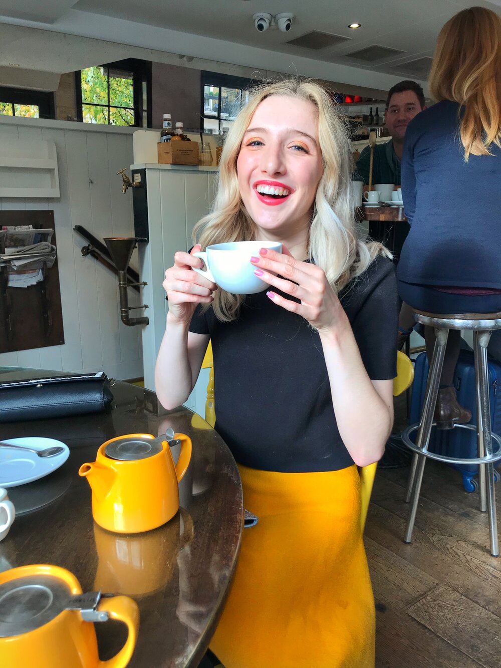 Mollie having a hot drink in a coffee shop. Mollie enjoying a hot drink in a coffee shop. Photo: Mollie Davies