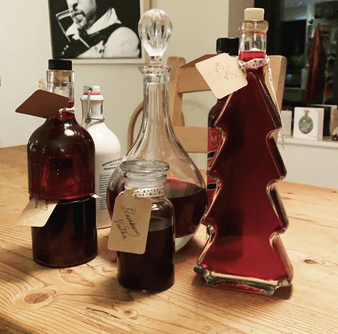 Bobby prepares batches of Sloe gin in bottles saved up over the year. Photo: Roberta Twidale