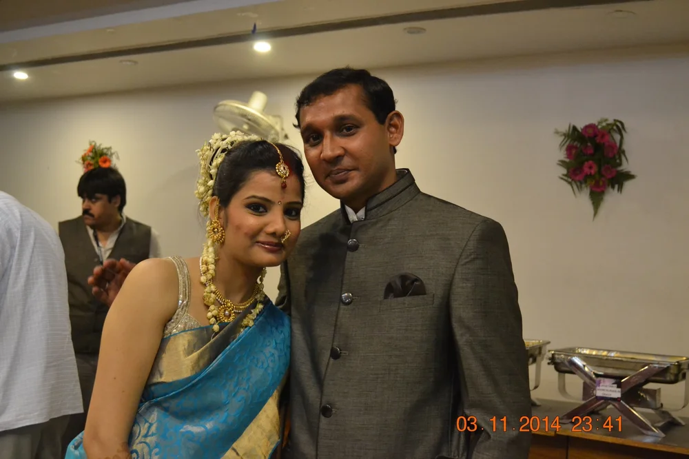 Gautami and her husband at a wedding