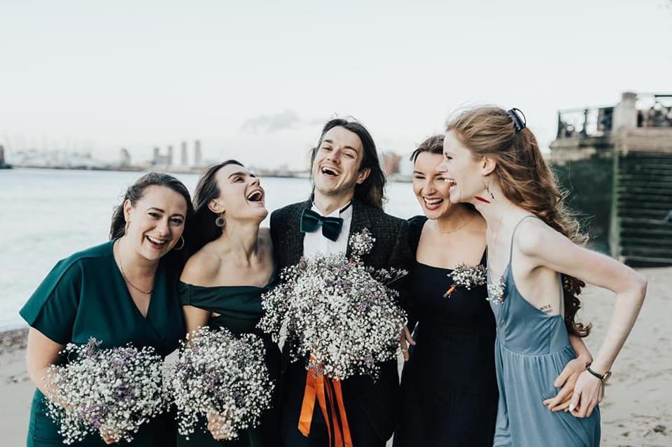 Sam with his bridal party on his wedding day. Photo: Rebecca Carpenter