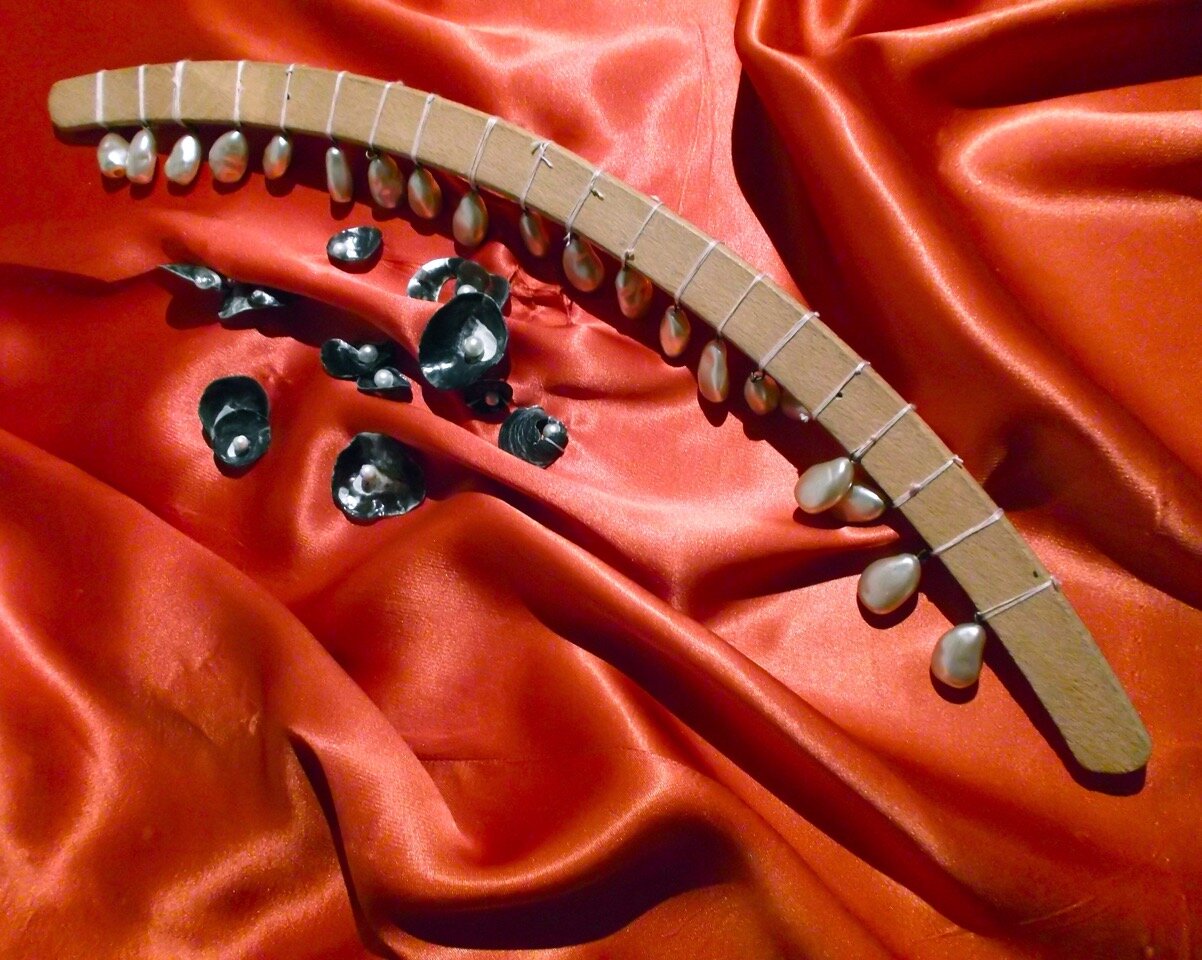  2013  satin, vintage hanger, thread, pearls, shells 