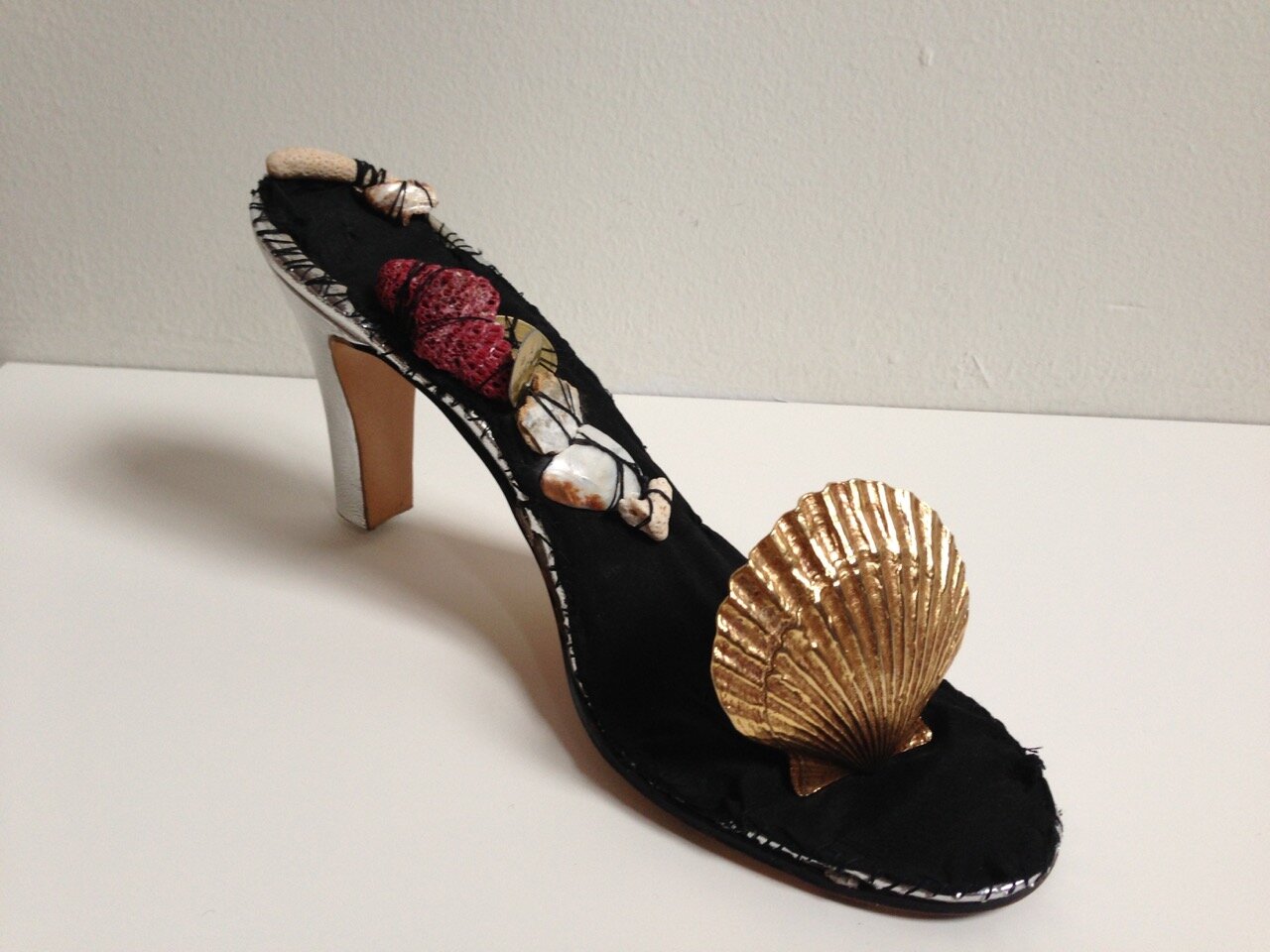   Sea Shoe , 2013  shoe, silk, coral, shells, jewelry parts, thread 