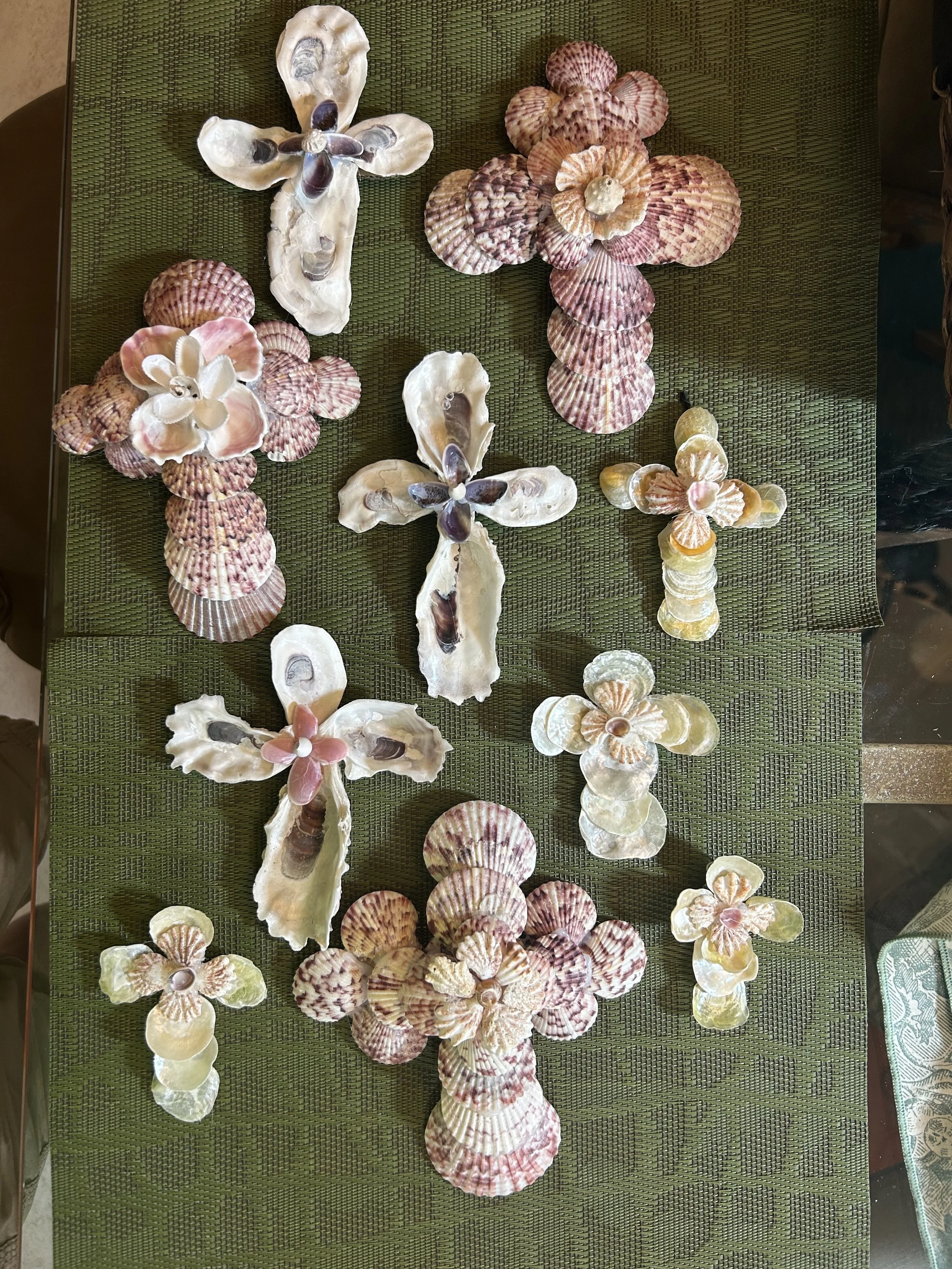 Crosses designed by Beth Basista from shells found at Bunche and Sanibel beaches in South Florida