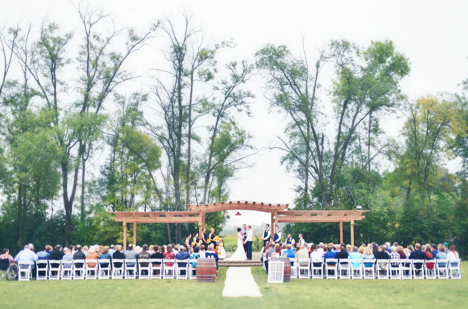 Outdoor, vineyard wedding at Crow River Winery in Hutchinson, MN