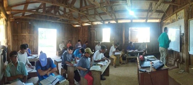 Pastors and church leaders in Latin America studying together during a Spanish-language BTCP training class.