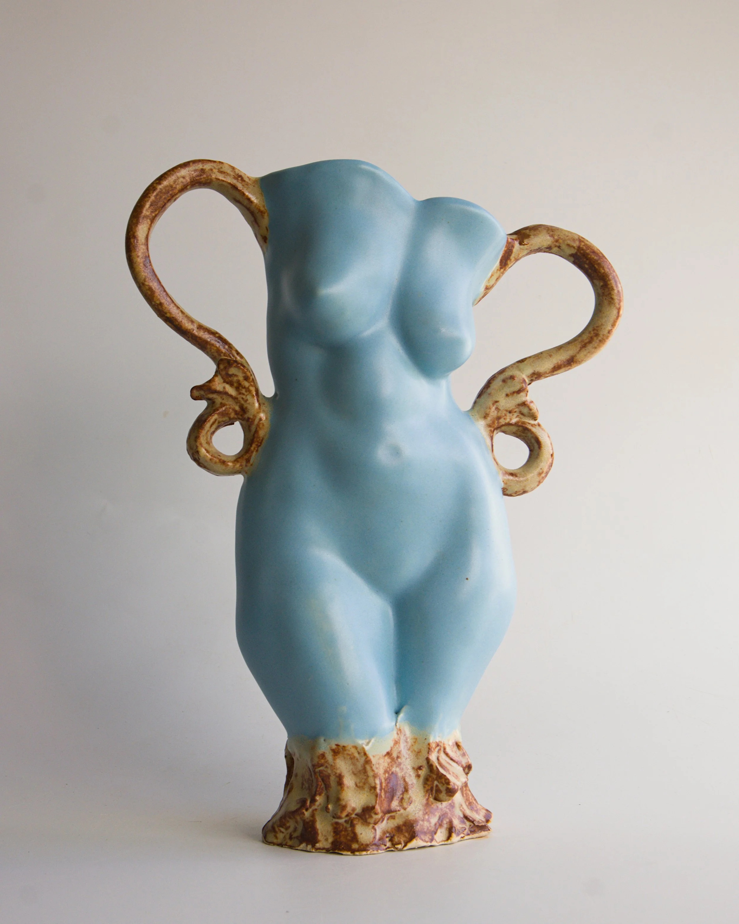Figurative ceramic vessel, satin matte blue glaze, rustic glazed handles, $335