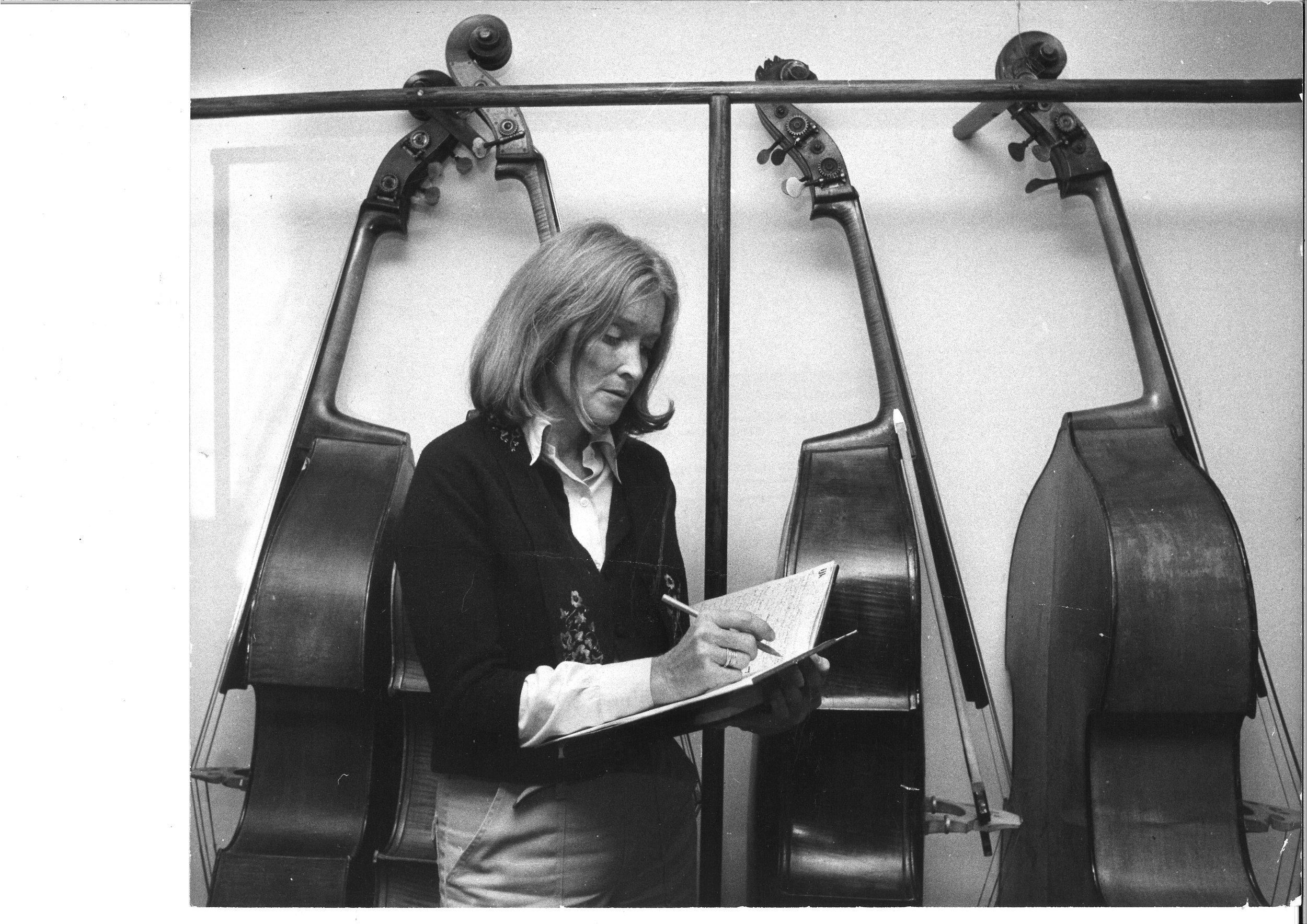 Sue Mingus with Mingus Basses (Mingus Archives).jpg