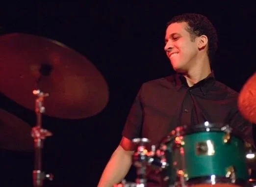 Adam Cruz, drums