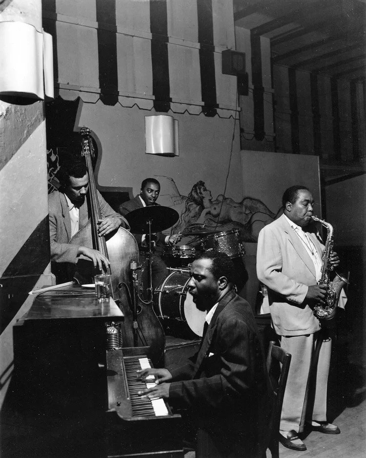 Memories of Bird &amp; Prez: celebrating the birthdays of Charlie Parker (Aug. 29, 1920) and Lester Young (Aug. 27, 1909)

1. Charles Mingus, Roy Haynes, Thelonious Monk, and Charlie Parker at the Open Door, NYC, Sept. 1953. Bob Parent, photographer.