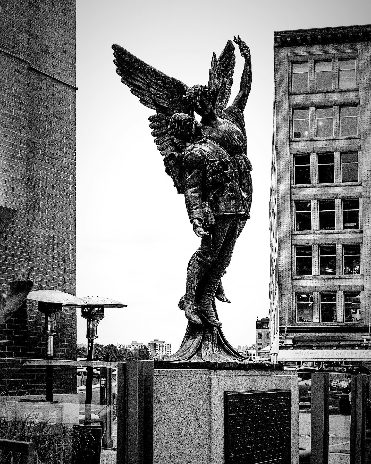 ANGEL OF VICTORY &gt;&gt;&gt; A heritage monument, this bronze figurative sculpture depicts an angel carrying a dead soldier and commemorates those who lost their lives in World War I. This is one of three identical statues commissioned by the Canadi