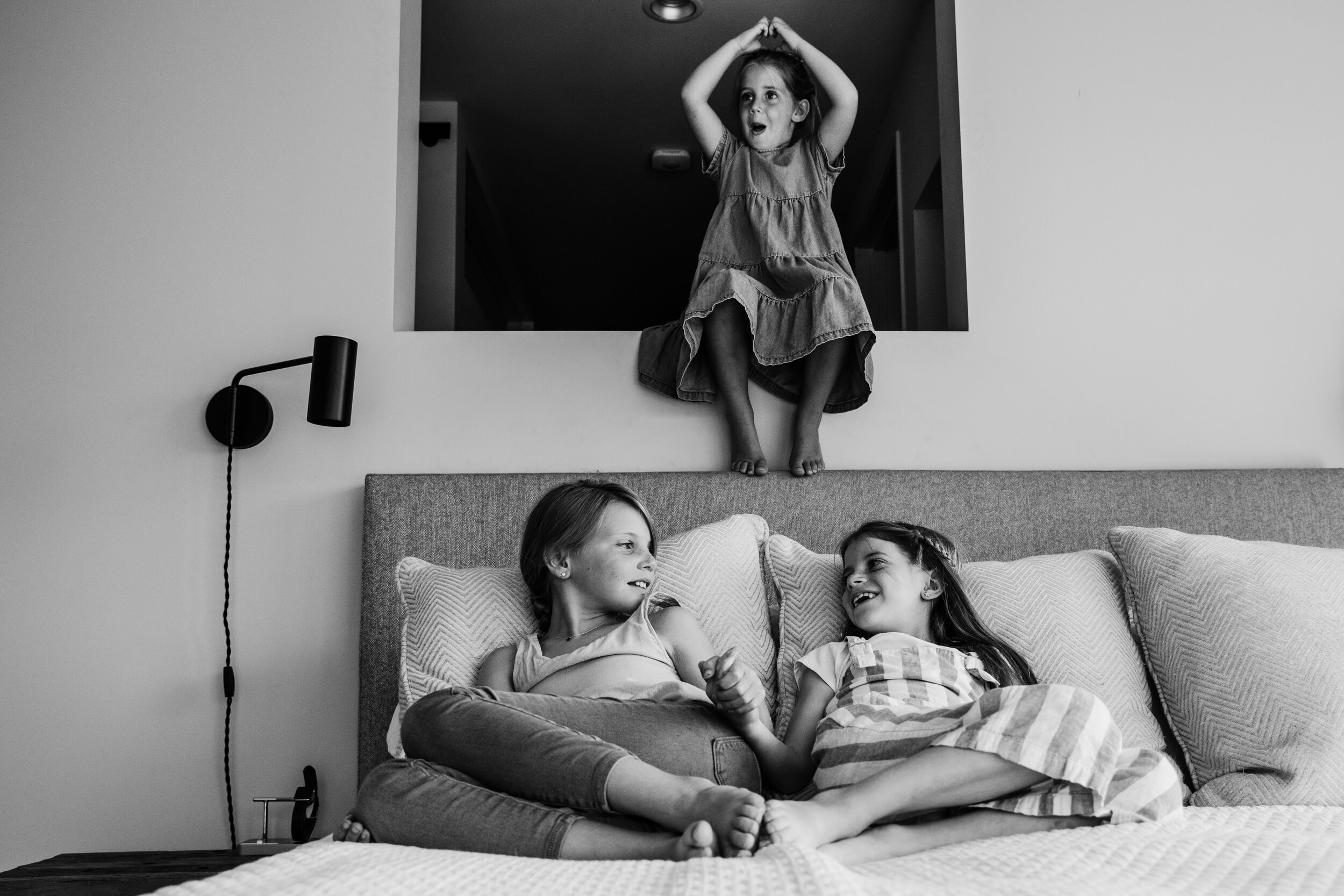 Girls being playful during a family photo session