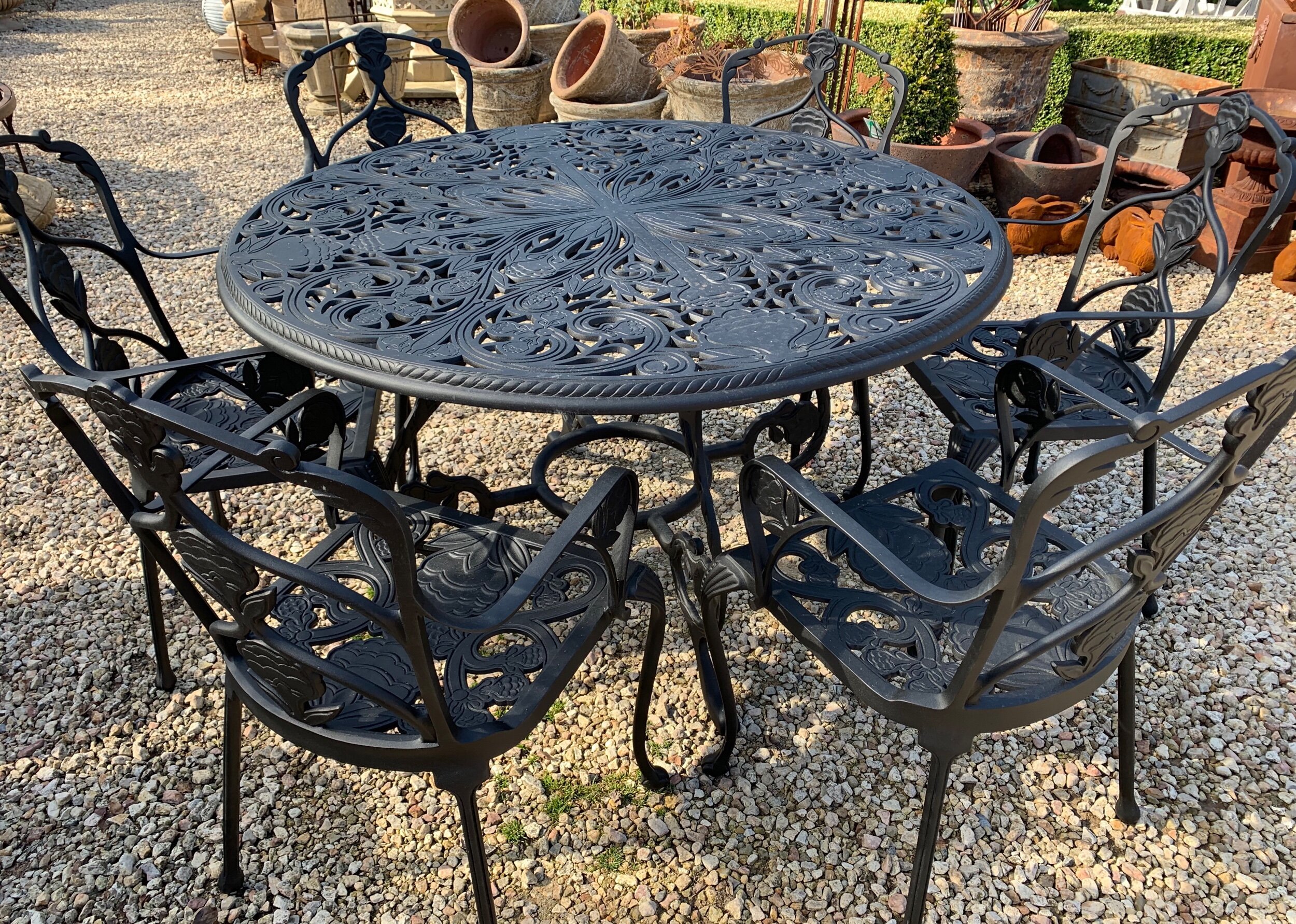 TC2011a-2012 Jekyll six seat cast aluminium table and chair setting $5800set