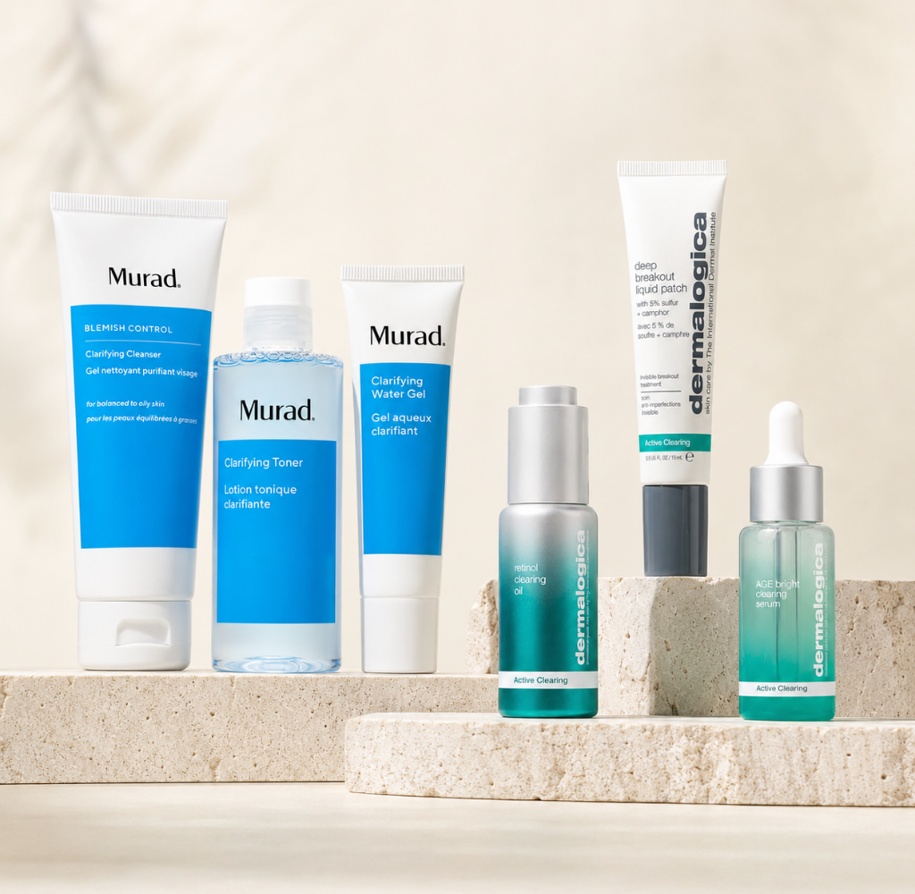 Professional acne home-care products from Murad and Dermalogica arranged for breakout-prone and congested skin.