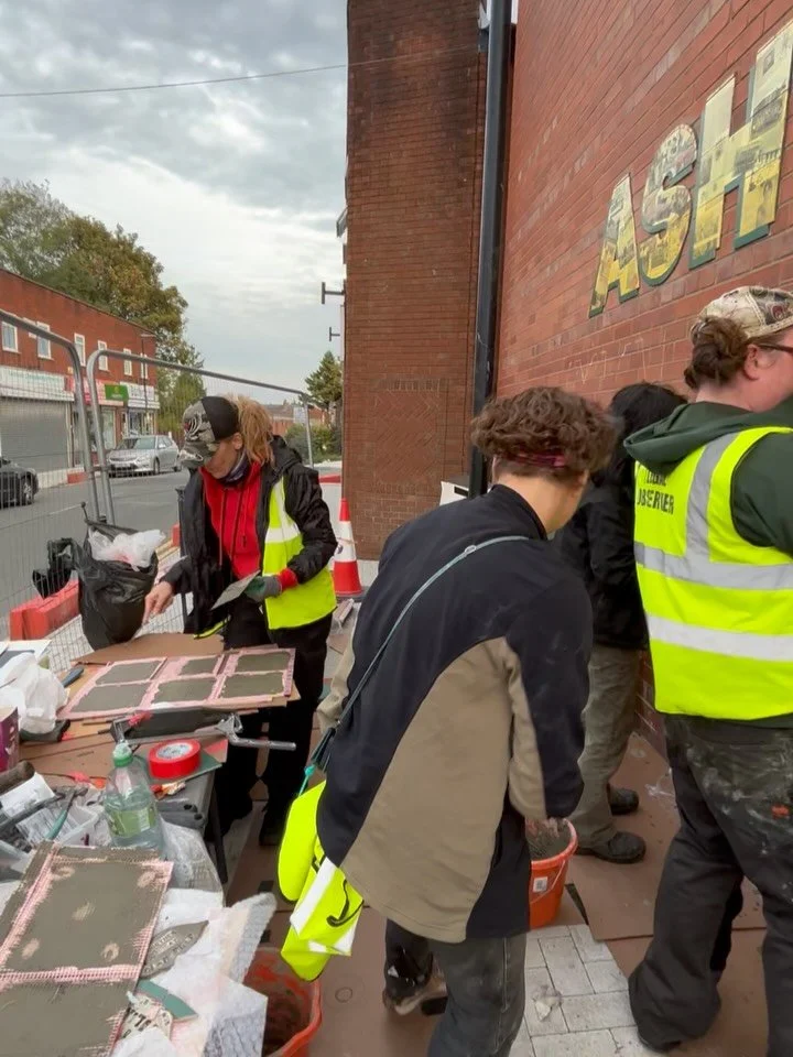 Day 1 of installation, and we&rsquo;ve already survived a vehicular assassination attempt. 💥🔨
On Monday, our 3-van convoy was cruising up from London when @mosaicallsorts blew a tire on the M5. A saint in a van pulled over to help jack up Tam&rsquo