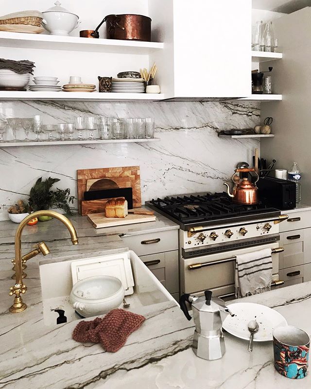 We love kitchens when they are imperfect, with dirty dishes and signs of lives well lived.