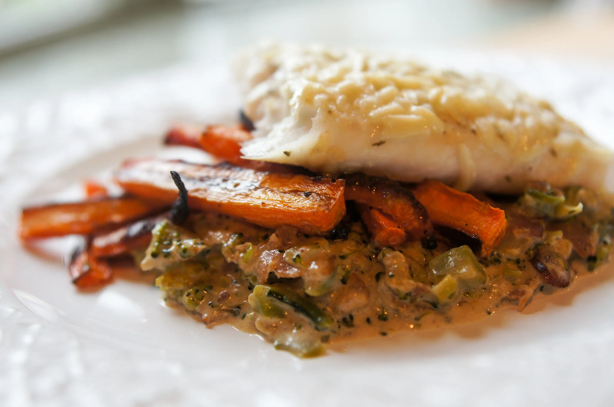 Baked Halibut with Roasted Carrots and Bacon Broccoli Cream Sauce